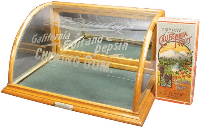 J. P. Primley's California Fruit Display Case: J. P. Primley's California Fruit and Pepsin Chewing Gum Oak Display Case. Curved glass etched front. Original maker label, J. Riswig, Chicago. Comes with Primley Gum Box. Excellent condition. 18 1/2 X