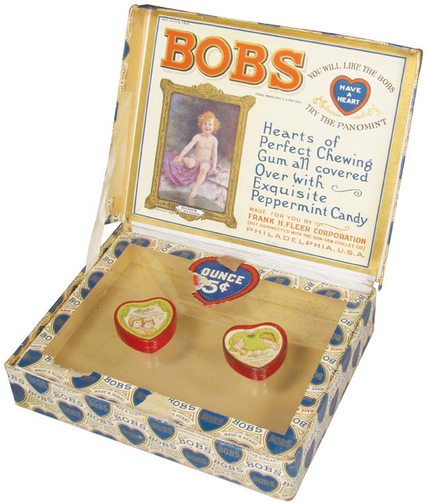 Bob's "Have a heart" Chewing Gum Display Box: Bob's "Have a heart" Chewing Gum Display Box. (2) Huyler's Sweet Heart Gum Tins. Box has minor discoloration and paper loss around perimeter of glass lid frame, 7 1/2 X 1 1/2 X 6 1/2 inches. Tins have