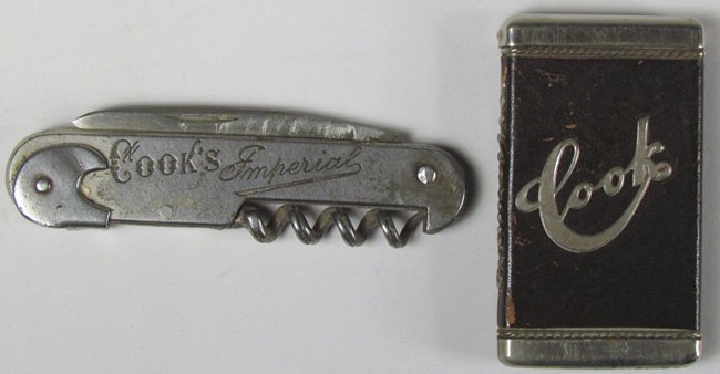 F.W. Cook Match Safe and Pocket Knife: F.W. Cook Match Safe and Pocket Knife w/corkscrew. Match safe is leather bound with metal overlay. Knife engraved Cooks Imperial-Extra Dry. Both in overall good condition.