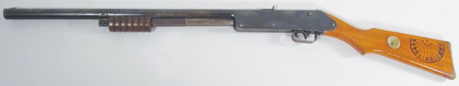Daisy 107 Pump Air Rifle, B-B Gun: Daisy 107 Pump Air Rifle, B-B Gun. Buck Jones. Daisy Mfg. Co. Plymouth, MI. Patented 1934. Sundial and compass on stock. Excellent original working condition. 36 inches long.