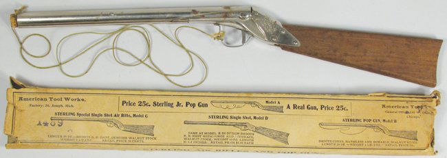 Sterling Jr. Pop Gun Model "A": Sterling Jr. Pop Gun Model "A". American Tool Works, Chicago. Comes in original box. Some minor pitting to barrel otherwise good condition. 17 inches long.