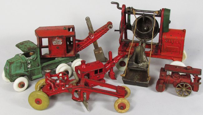 Five Cast Iron Construction Toys: Five Cast Iron Construction Toys. Kenton, 1930 Jaeger cement mixer. Kenton road grater. Hubley "General" digger. Steam road roller. Small red digger, 5 inches long.