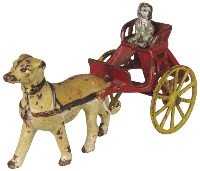 Original Arcade Cast Iron Dog Cart Pull Toy: Original Arcade Cast Iron Dog Cart pull Toy. Cast iron puppy in seat. Most original paint intact. 6 1/2 inches long.