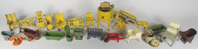 Twenty Three Cast Iron Doll Furniture Pieces: Twenty Three Cast Iron Doll Furniture Pieces. Including Arcade washer, ringer. Kilgore Bathroom fixtures and nursery furniture. Overall good to very good condition.