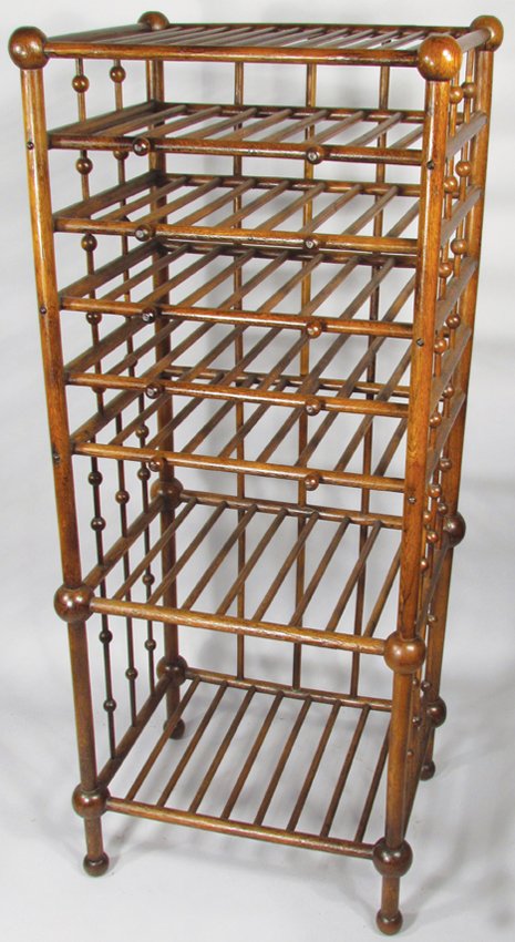 Oak Stick and Ball Magazine Rack: Oak Stick and Ball Magazine Rack. Excellent Refinished Condition. 18 X 44 X 14 inches.