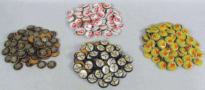Quantity of Vintage Soda Bottle Caps: Quantity of Vintage Soda Bottle Caps. Approximately 395 caps. 4 different brands including Blue Bird Grape Soda, Mason's Root Beer, Frostie and Brownie Root Beer. NOS condition.