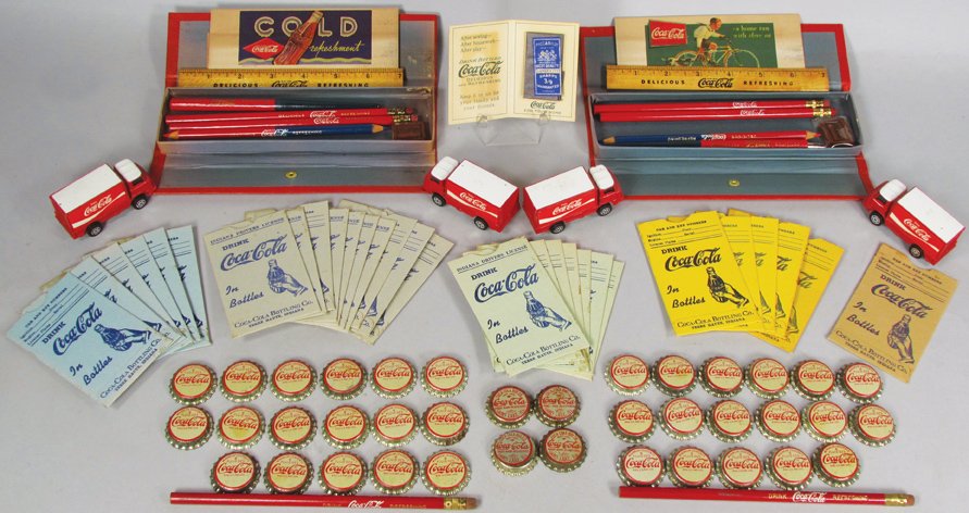 Quantity of Vintage Coca Cola Advertising Items: Quantity of Vintage Coca Cola Advertising Items. (29) Key Envelopes, Terre Haute, IN. (39)Bottle Caps from Jackson, Calif and Gray's Lake, IL. Pencil Boxes and pencils, (4) toy delivery trucks and nee