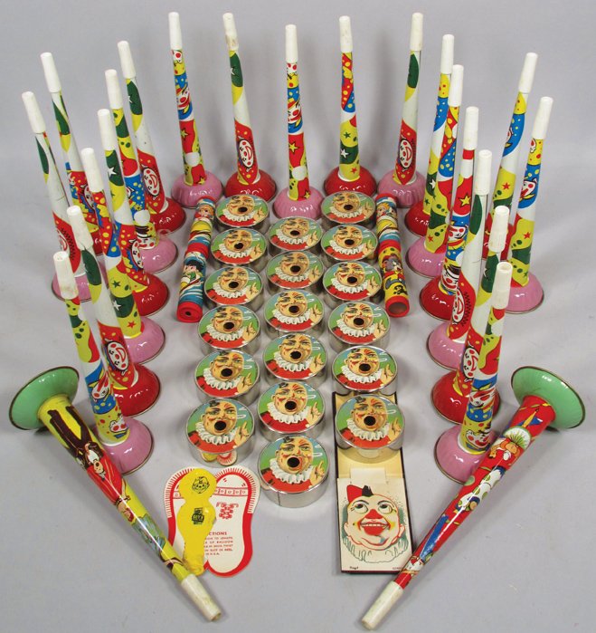 Quantity of Vintage Novelty Toys: Quantity of Vintage Novelty Toys. (26)Tin horns, Kaleidoscopes, Clown blowing smoke rings, Clown balloon and German Clown Novelty. NOS condition.