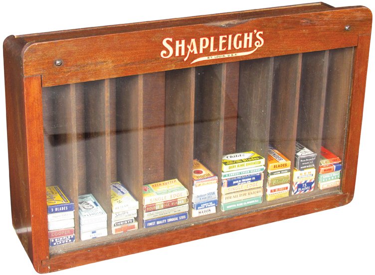 Shapleigh's Safety Razors Store Display Case: Shapleigh's Safety Razors Store Display Case. Wood and glass with original decal. Excellent condition. 15 1/4 X 9 1/2 X 3 1/2 inches.