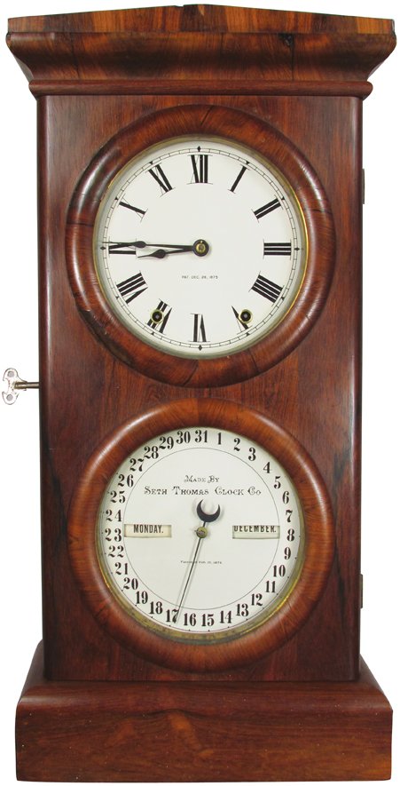 Seth Thomas Clock Co. Antique Calendar Clock: Seth Thomas Clock Co. Antique Calendar Clock. Double dial. Patent dates 1875/1876. Comes with key and pendulum. Good working condition.