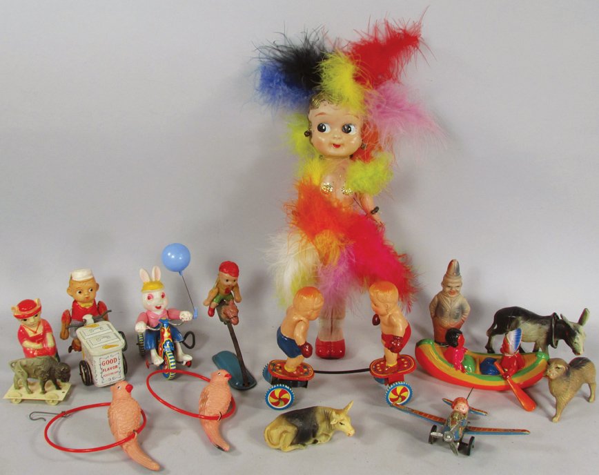 Collection of Early Celluloid Toys: Collection of 15 Vintage Celluloid Toys. Cupie with feathers. Horse Race and Boxing Boys with original box. Bunny on bike, Airplane and Ice cream mechanical toys. Donkey nodder and buffalo pull toy.