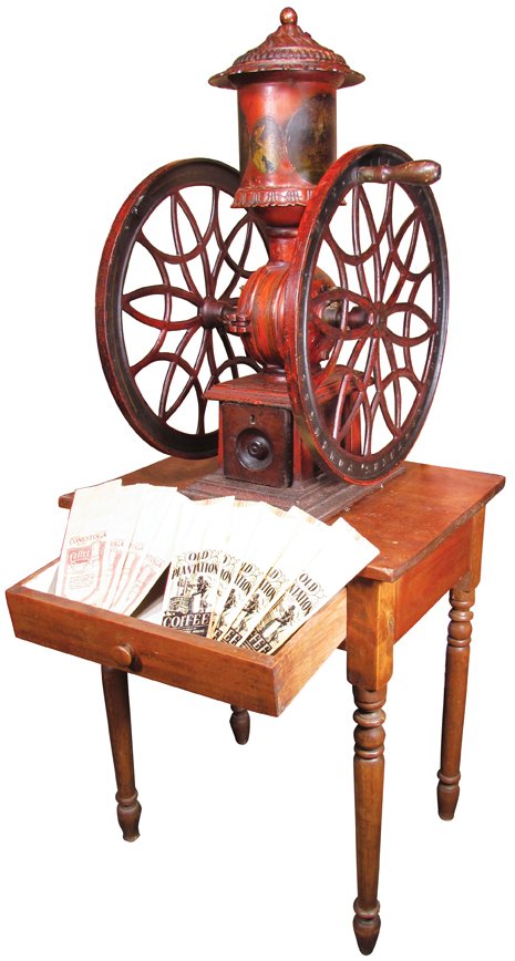 The Swift Mill Lane Bros. Coffee Grinder: No. 15 Swift Mill Lane Brothers Cast Iron Counter Top Coffee Grinder, Poughkeepsie, NY. Comes with oak table and early coffee bags. Original paint, stenciling and pan. Wheel measures 19 1/2 X 30 inche