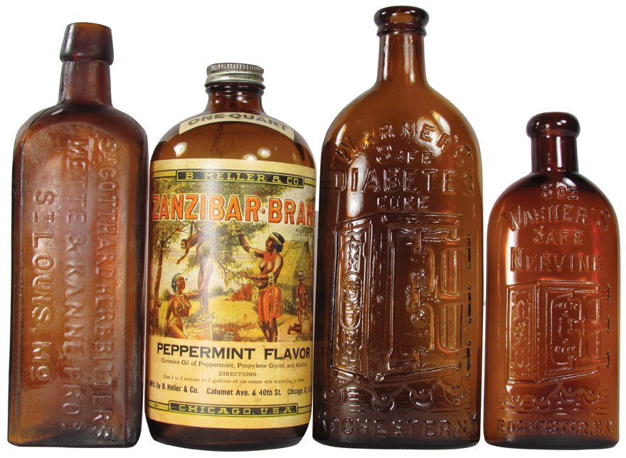Four Antique Amber Glass Bottles: Four Antique Amber Glass Bottles. Warner's Safe Nervine & Diabetes Cure embossed tonic bottles, Rochester, NY. Zanzibar Brand Spearmint with original paper label. St Gotthard Herb Bitters Embossed Bot