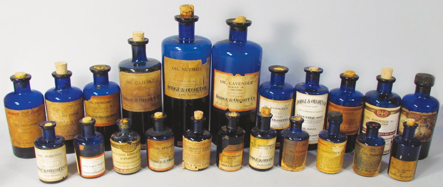 Dodge & Olcott Co. Apothecary Bottles: Collection of Dodge & Olcott Co. New York Cobalt Blue Apothecary Bottles. 22 bottles total with original paper labels. Some paper loss and discoloration on the labels otherwise overall good condition.