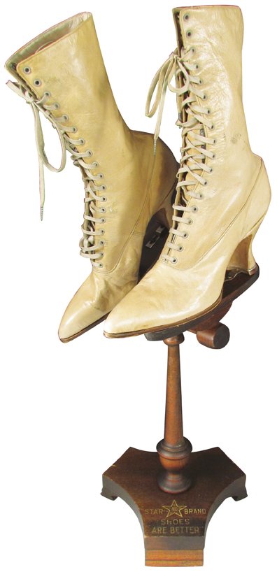 Star Brand Shoes Wood Store Display Rack: Star Brand Shoes Wood Store Display Rack. Comes with pair of antique woman lace up shoes. Excellent original condition. 15 inches tall.
