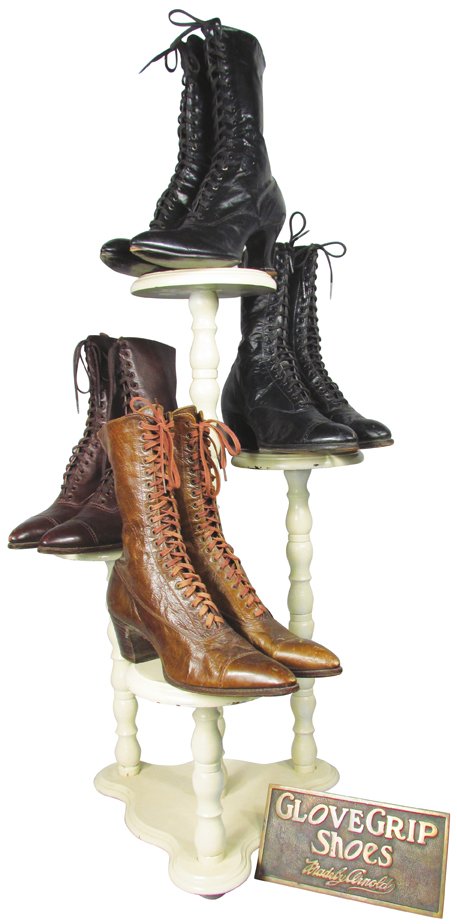 Shoe Store Display & Glove Grip Shoe Plaque: Wood Shoe Store Display with Glove Grip Shoe Brass Plaque. Comes with 4 pr of Ladies antique lace up shoes. Excellent overall condition. 27 inches tall w/o shoes.