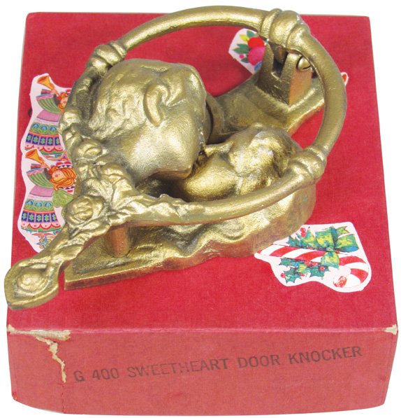 Cast Iron Figural Door Knocker, Sweetheart: Cast Iron Figural Door Knocker, Sweetheart. Comes in original box, unused condition. 3 1/4 X 5 1/2 X 1 1/2 inches.