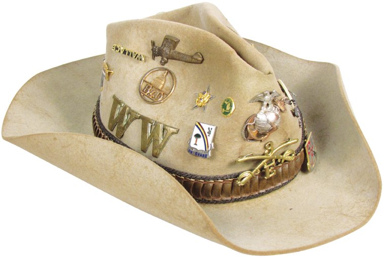 Vintage Stetson Hat Adorned with Pins/Badges: Vintage Stetson Hat with pins and military badges attached. Civil war crossed sabers, Lindberg Plane, Marine pins and more. Hat in worn condition.