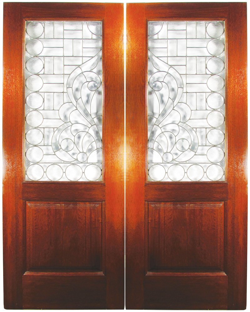 Pair of Beveled and Leaded Glass Doors: Pair of Beveled and Leaded Glass Doors. Circa 1900 Chicago. Mahogany with textured glass. No cracks, excellent condition. Each measures 30 1/2 X 80 inches.