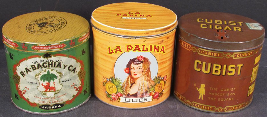 Three 50 Count Cigar Tins: Three 50 Count Cigar Tins. La Palina, Cubist and La Flor De R-A-Bachia y Ca. Overall good condition.