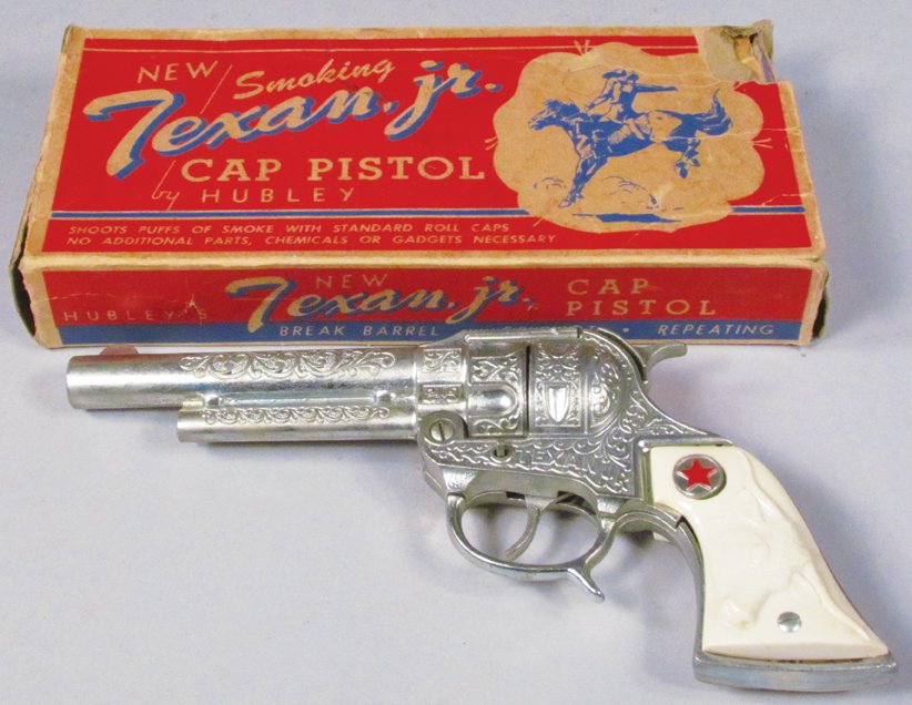 Hubley Texan Jr Smoking Toy Cap Pistol: Hubley Texan Jr Smoking Toy Cap Pistol # 250 in original box. Box had detached flaps, gun excellent condition.