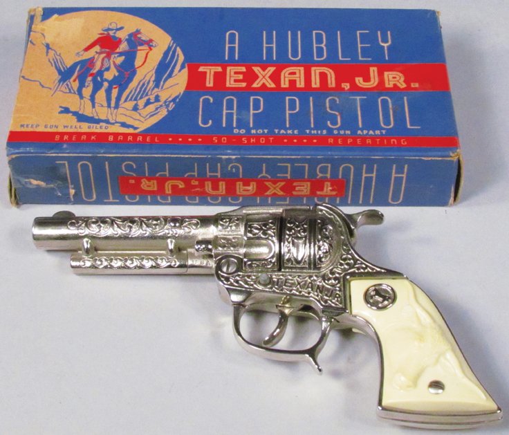 Hubley Texan Jr Toy Cap Pistol: Hubley Texan Jr Smoking Toy Cap Pistol in original box. Box had detached/repaired flaps, gun like new condition.