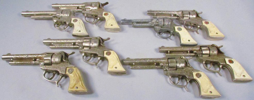 Eight Hubley Texan Toy Cap Pistols (1 of 1)