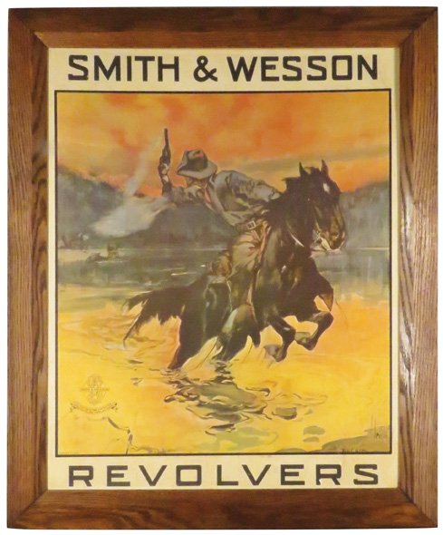 Smith & Wesson Revolver Cardboard Sign: Smith & Wesson Revolver Cardboard Sign. Age unknown. Age discoloration. Framed. 22 X 25 1/2 inches overall.