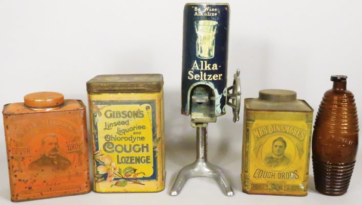 Collection of Pharmacy Related Advertising Items: Collection of Pharmacy Related Advertising Items. Alka Seltzer Dispenser. Old Sachem bitters bottle (chip on lip). Mrs. Dinsmore's, Gibson's and Moses cough drop tins. Overall fair condition. Dispense