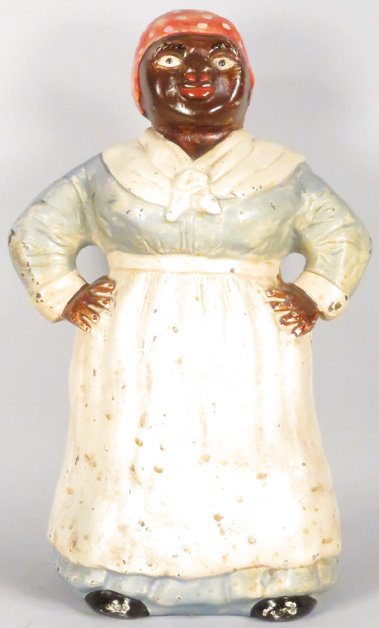 Hubley Cast Iron Southern Mammy Doorstop: Hubley Cast Iron Southern Mammy Doorstop. Full figured. Most original paint intact, good condition. 7 1/4 X 12 inches.