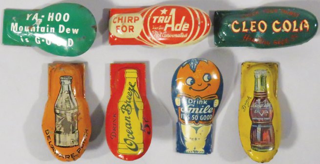 Collection of 7 Soda Advertising Tin Litho Clickers (1 of 1)