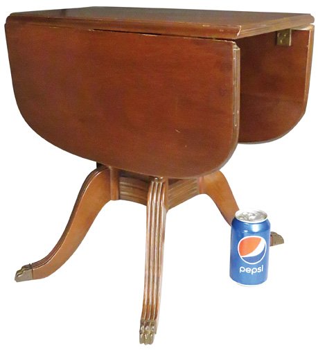 Salesman's Sample Dining Table: Salesman's Sample Dining Table. 1940's Duncan Phyfe style with drop leaf sides. Good original condition. 26 X 17 17 1/2 X 18 inches.