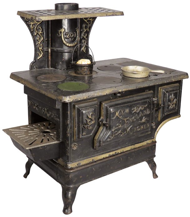 Child's Wilkins Model 201 Cook Stove: Turn of the Century Child's Wilkins Model 201 Cook Stove. Made in England. Black cast iron. Comes with accessories. Good condition. 15 X 15 X 8 3/4 inches.