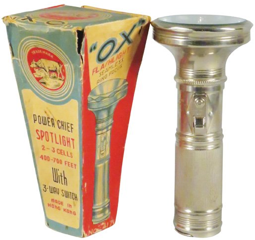 "OX" Flashlight in Original Box: OX Flashlight in Original Box. Great graphics on box. Flashlight in NOS condition, box shows wear. 7 1/2 inches tall.