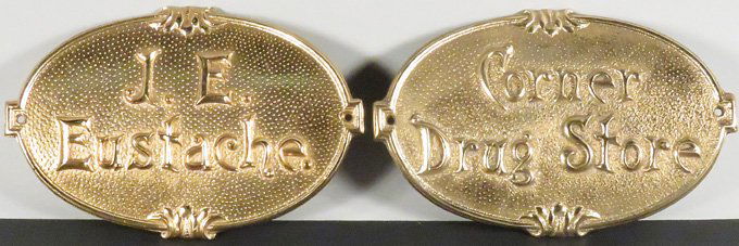 Two Cash Register Breast Plates (1 of 1)