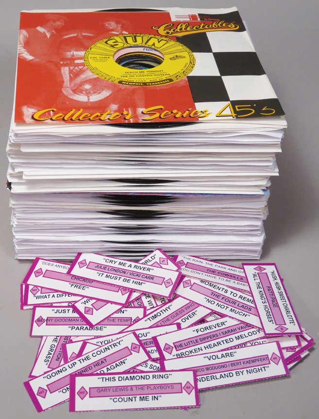 Collection of 45 RPM Records for Juke Boxes: Collection of 45 RPM Records for Juke Boxes. Hit Parade Standards Vol 1 & 2 and The 50's Vol 1. 57 records total. Comes with title tabs for your juke box.