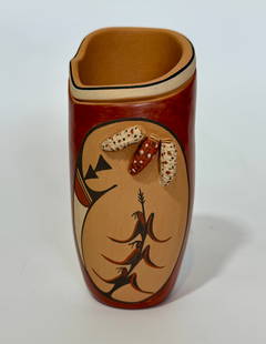 Marie G. Romero polychrome tall cornpot: Marie G. Romero of Jemez Pueblo, polychrome tall cornpot, from Jemez Pueblo. 5.75" high by 2.5" diameter. Circa 1991. Her works not only celebrate the heritage of Jemez Pueblo but also show a high lev