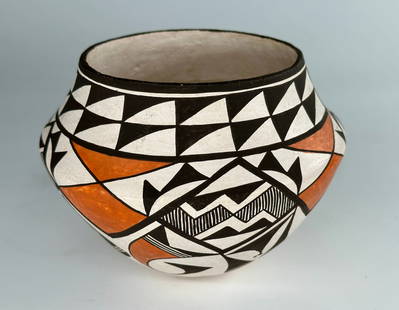 Lucy Lewis polychrome pot: Lucy Lewis, Acoma Pueblo, polychrome pot. byLucy M. Lewis, a celebrated potter from Acoma Pueblo, was instrumental in reviving ancient Mimbres black-on-white pottery designs, blending traditional tech