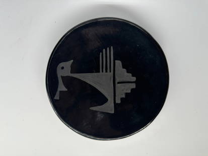 Pottery plate with black-on-black abstract bird design by Juanita Martinez, sister of Maria Martinez: Pottery plate with black-on-black abstract bird design by Juanita Martinez, sister of Maria Martinez. Ex-The Rainbow Man Santa Fe NM. 6" diameter and Circa 1920's. 9 Ounces.