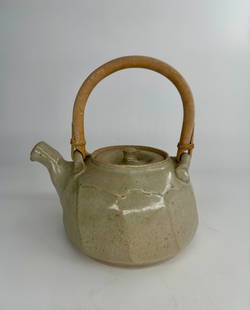 Warren MacKenzie teapot: Warren MacKenzie teapot with tiny chip on spout. Purchased directly from the artist here in Minnesota. 5" tall plus handle, and 7.75" wide and about 3 pounds. MacKenzie and his first wife, Alix, studi