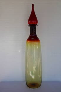 Blenko Floor Vessel/Bottle with Stopper by Wayne Husted: Architectural Blenko floor vessel/bottle with stopper by Wayne Husted with label. Bottle (without stopper) is 27.5" high and 8" diameter. Stopper is 12" high and 4.5" diameter. Bottle (with stopper) i