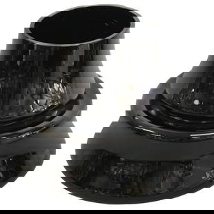 Vase by Sergio Asti, Salviatti, Italy: Art glass vase in black designed by Sergio Asti and manufactured by Salviati. Signed Salviati on the bottom. The vase measures 7.5" high, 4.75" top diameter and 9" bottom diameter.