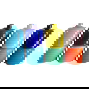 Eight Murano Stackable Glass Vases for Venini: Eight stackable glass vases attributed to Timo Sarpaneva for Venini. Each glass vase measures about 6.5" high and 5" diameter.