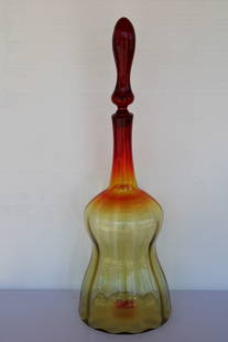 Blenko Vessel with Stopper and Label: Blenko hand blown vessel with stopper and label. Vibrant colors of yellow, orange and red. Vessel measures 28.5" with stopper, 20" without and 8.75" diameter. Stopper is 9.5" tall. Manufactured by Ble