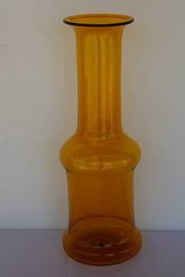 Blenko Caramel Vessel: Blenko hand blown caramel vessel. Vessel measures 24" high, 6.5" diameter on top and 8" bottom. Manufactured by Blenko, USA. Blenko Glass Company is an art glass company that began producing in 1922 u