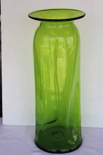 Hand Blown Green Vase by Blenko Glass Company: Hand Blown Blenko green dimple vessel. Vase measures 22" high and 8.75"diameter on top and 8.5" diameter on bottom. Manufactured by Blenko, USA. Blenko Glass Company is an art glass company that began