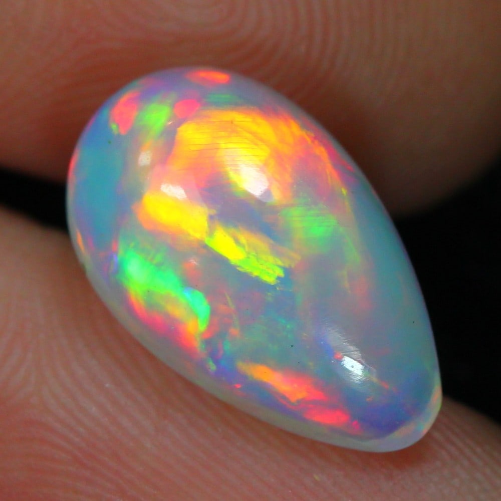 3.27carat Natural Ethiopian Welo Opal Loose Gemstone: Showcasing Ethiopian Welo Opal loose gemstone, weight approximately 3.27carat, measuring 14.8x9.0x6.0mm, exemplifies the stunning play-of-color and exquisite craftsmanship that Welo Opals are renowned