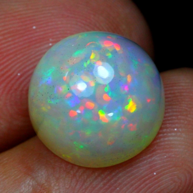 Exquisite 7.39 Carat Ethiopian Welo Opal - Radiant Play of Colors (1 of 7)
