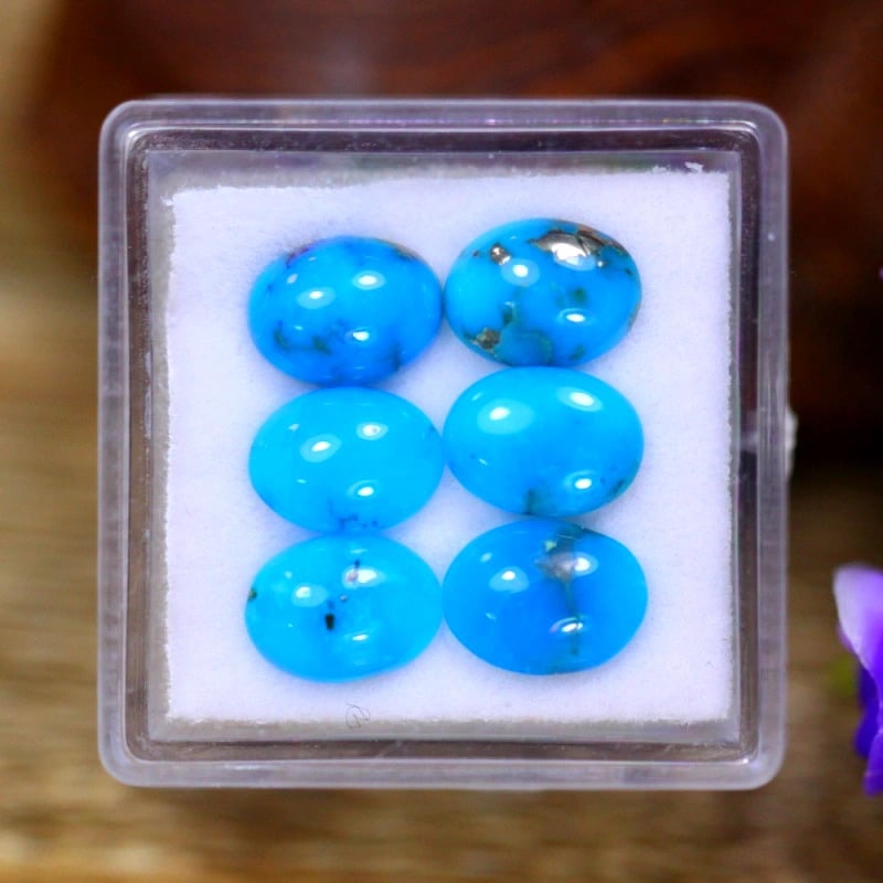 Timeless Arizona Turquoise Gemstone - 5.3 Carats: Auction lot of 5.3 carat Arizona Turquoise, measuring 7.9x5.9x2.4mm. Birthstone for December and is often used in rings, pendants, and bracelets. It is traditionally gifted for the 11th wedding annive