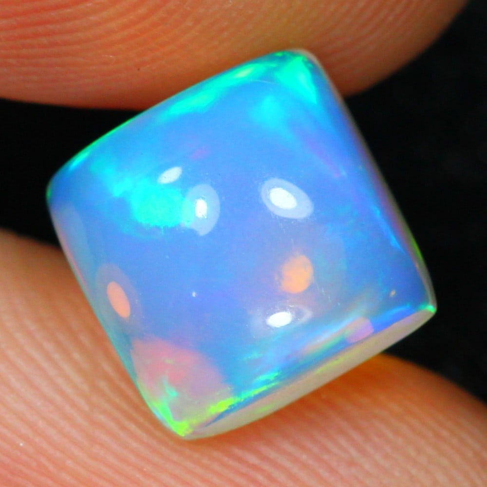 Exquisite 2.80 Carat Ethiopian Welo Opal Gemstone: Auction lot of 2.80-carat Ethiopian Welo Opal, measuring 9.1x9.0x5.4mm. Birthstone for October and is often used in rings, pendants, and earrings. It is traditionally gifted for the 14th wedding anniv